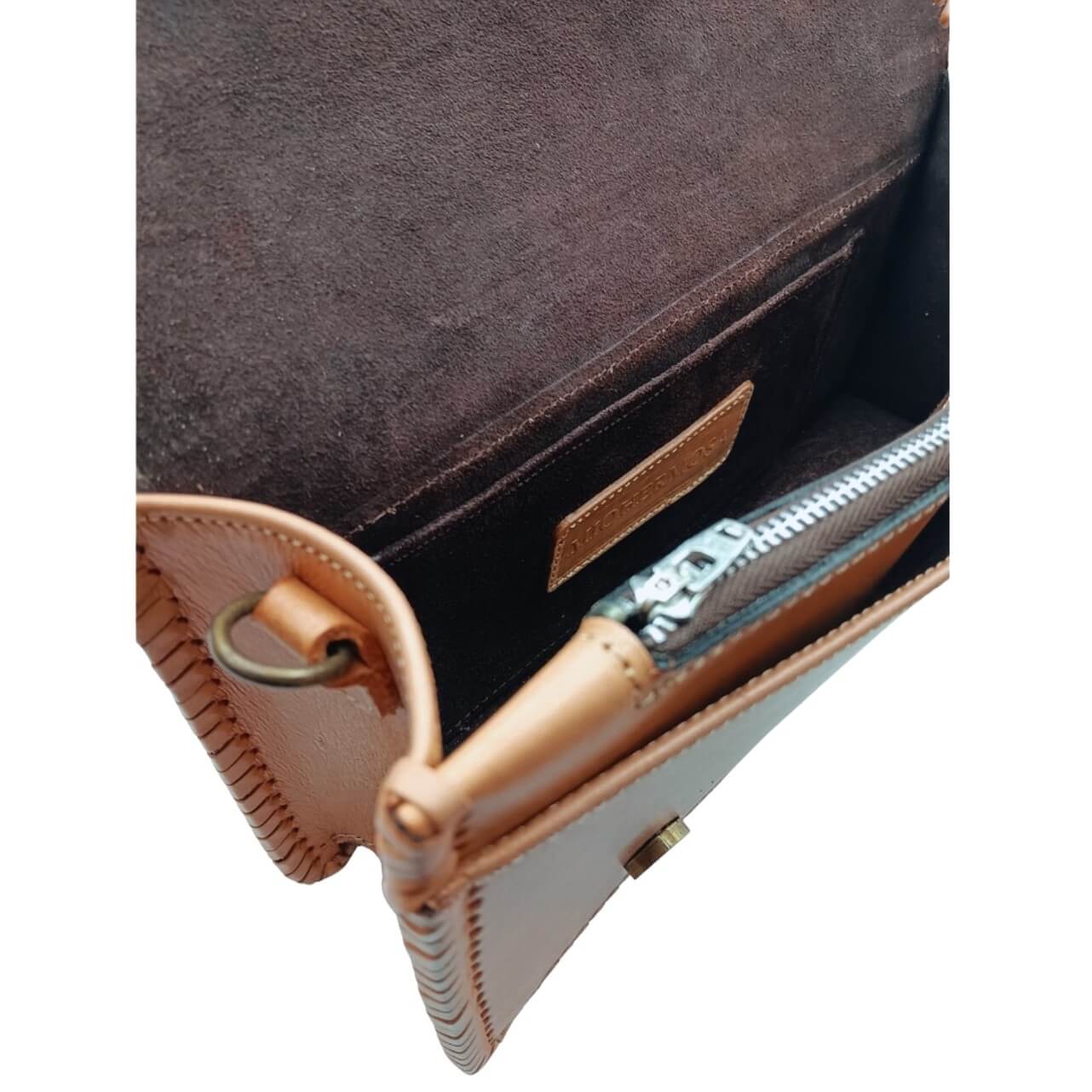 Interior of suede‑lined handbag with zip pocket and slip pocket – Crimson Legacy