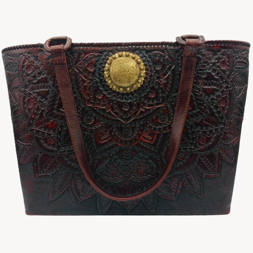Full‑grain tooled leather tote with mandala and gold concho – front view