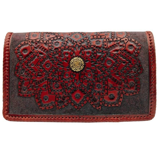 Front view of hand‑tooled full‑grain leather crossbody with embossed mandala and brass concho in deep crimson.