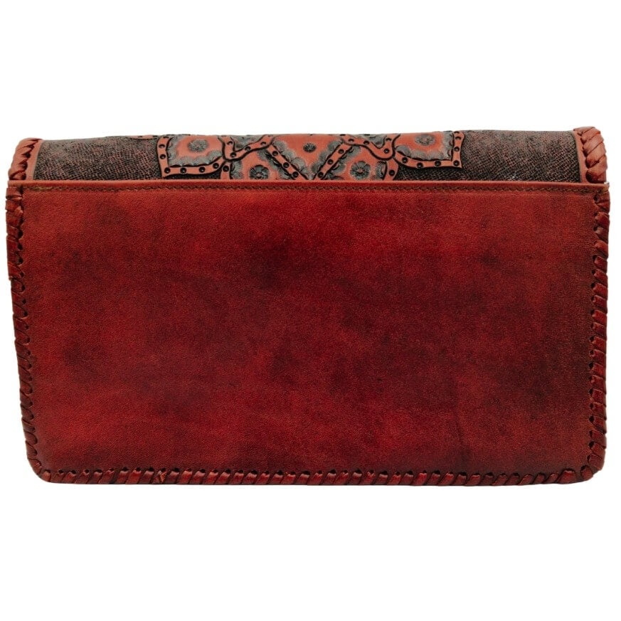 Back of bag—smooth burnished crimson leather with exterior slip pocket and whipstitch edges.