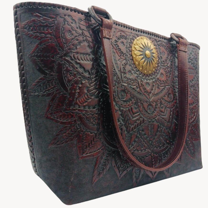 miohermosa-serenidad-eterna-tooled-leather-purse-left-angle