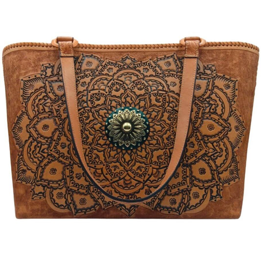 Front view—hand‑tooled full grain leather tote with mandala rosette and brass concho, cognac.
