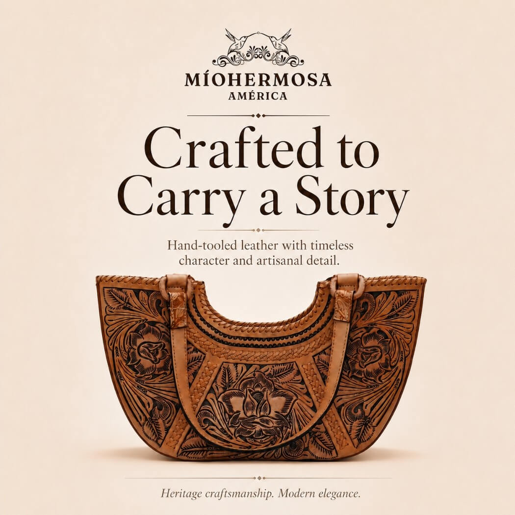 Natural tan hand-tooled floral leather crescent shoulder bag displayed in a Crafted to Carry a Story promotional graphic with Miohermosa logo.