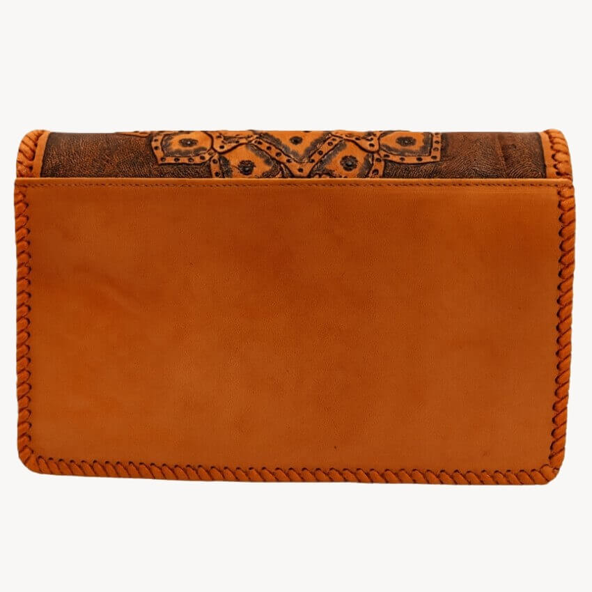 Back view of Sedona Mandala Tooled Leather Crossbody in smooth full-grain leather burnt orange