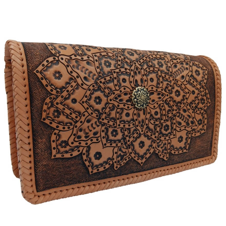 Angled left view of handmade tooled leather purse with mandala design – Crimson Legacy