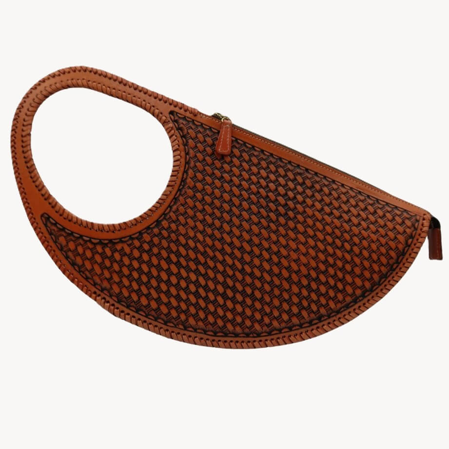 basketweave back of full‑grain leather half‑moon handbag