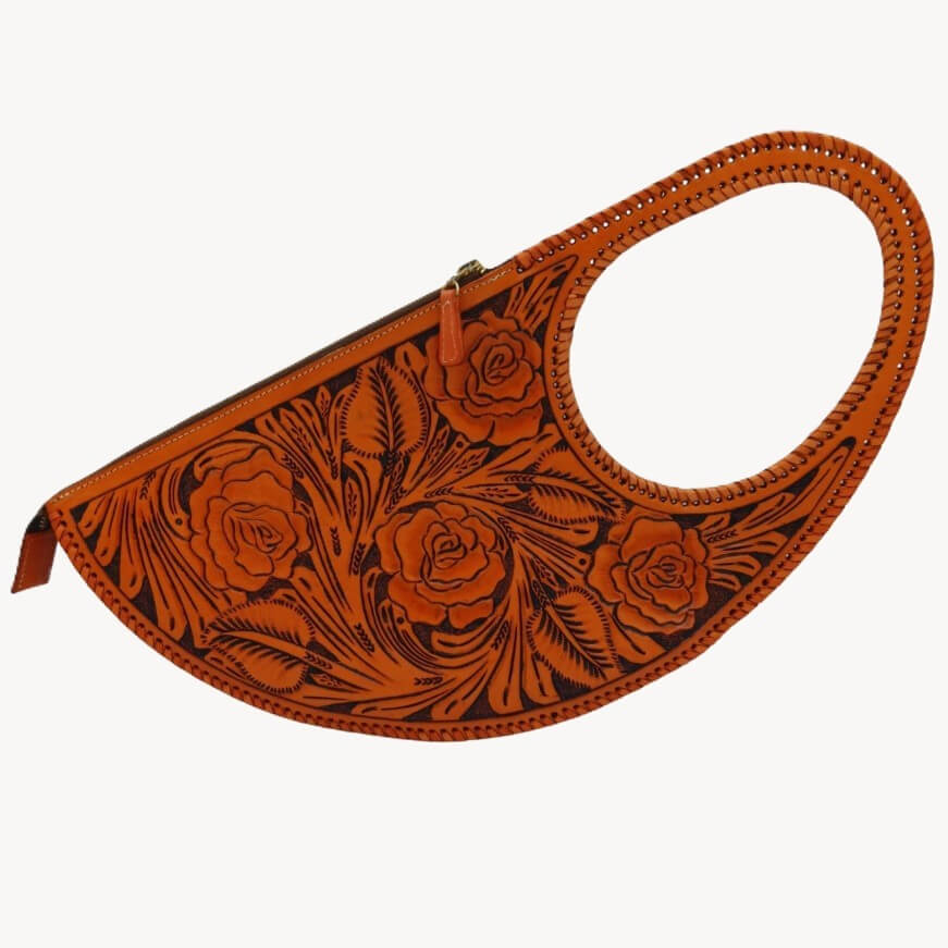 Half‑Moon Tooled Leather Clutch in full grain leather, rose‑tooled front