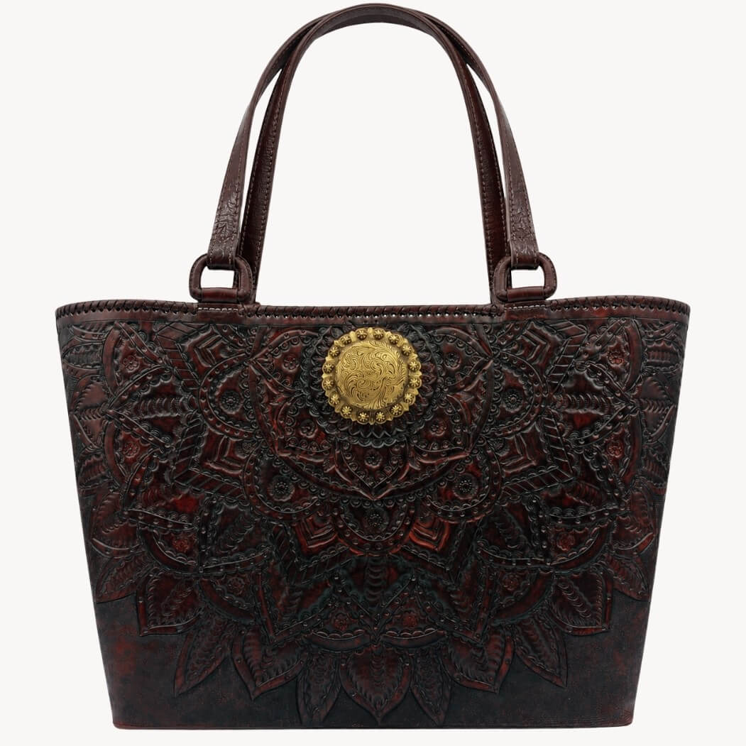 Mahogany espresso floral embossed leather tote handbag with top handles and a round gold medallion.