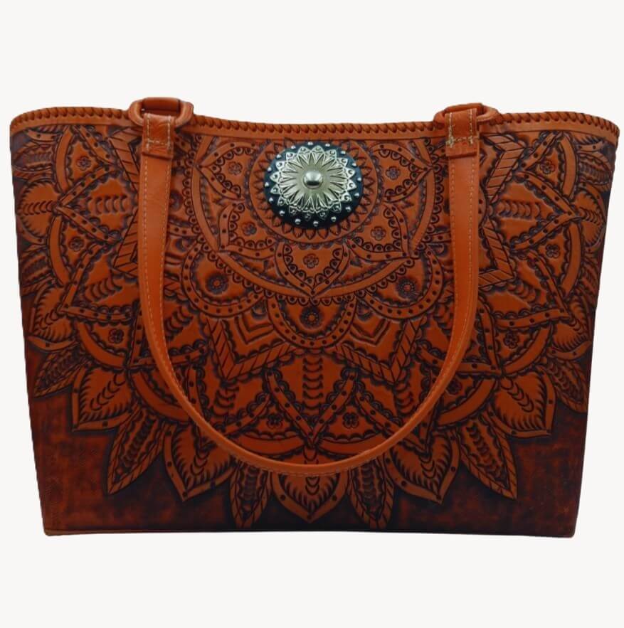 Caléndula de Cobre full‑grain tooled leather tote with marigold mandala and silver concho—front view, Miohermosa