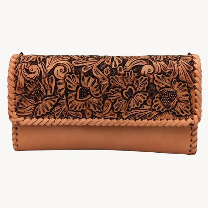 Front view of Miohermosa Corazón Flora tooled full grain leather clutch, floral motif, tan.