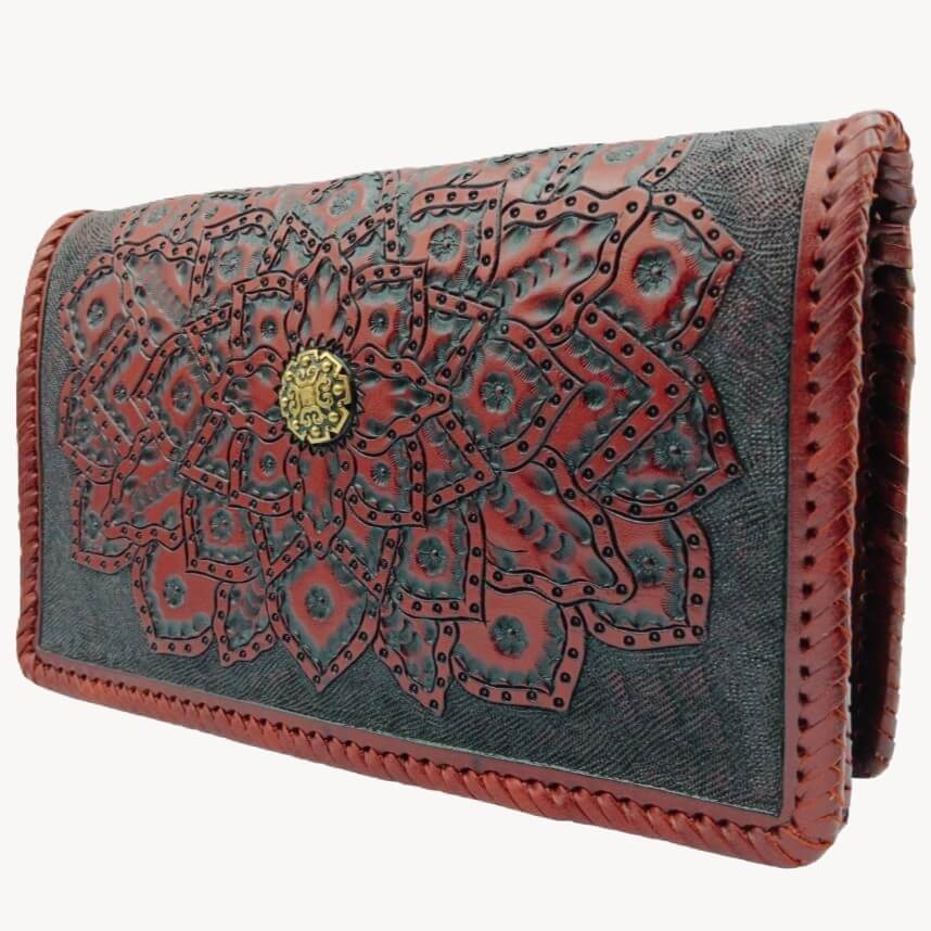 Right‑angle view highlighting depth of mandala embossing and textured backdrop.