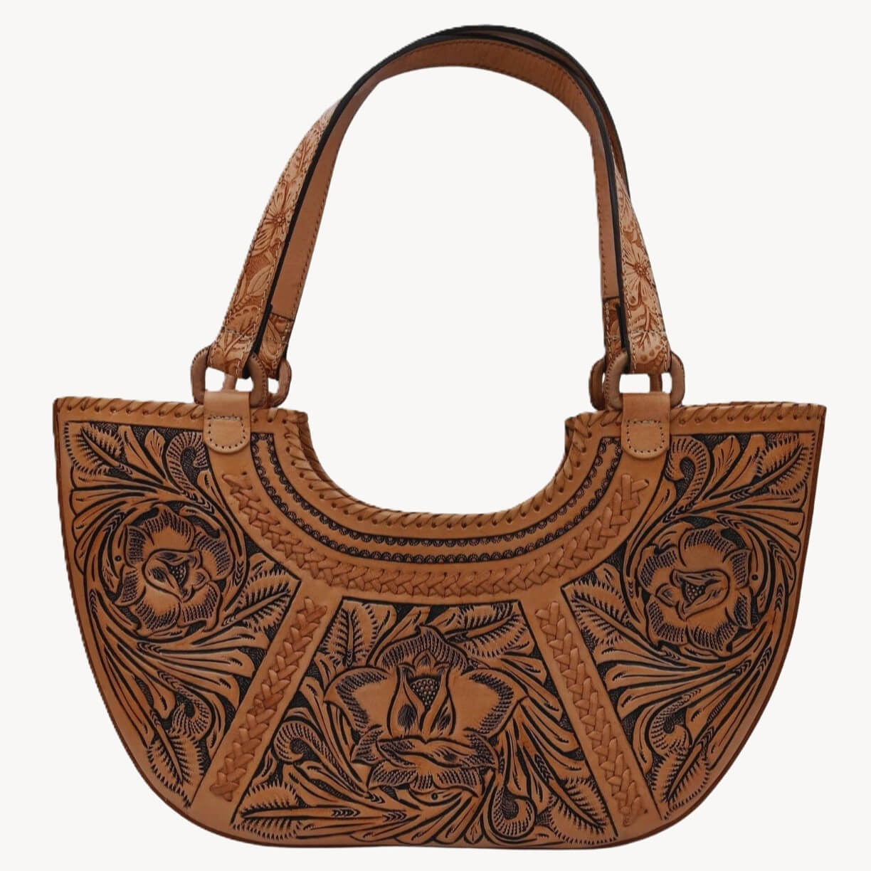 Handles of Flor de Cordoba Full Grain Tooled Satchel extended for shoulder carry