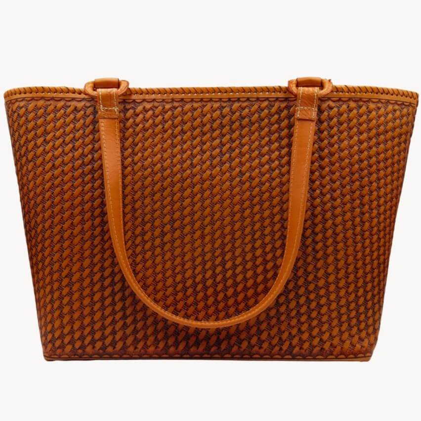 Honeycomb‑textured full‑grain leather back panel with shoulder straps.