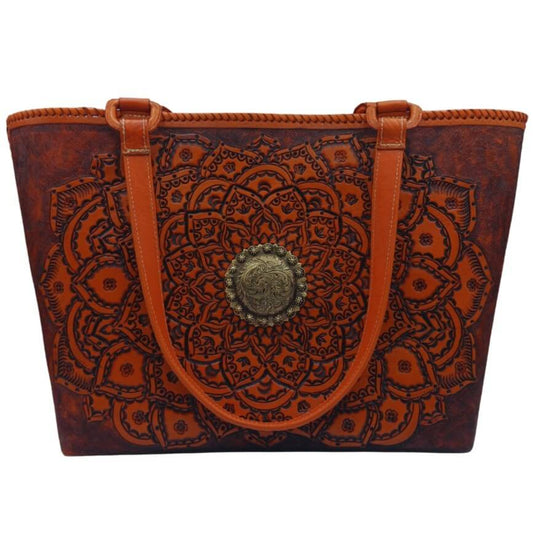 Front view of Sol de Oro full grain leather tote with hand‑tooled mandala and brass concho.