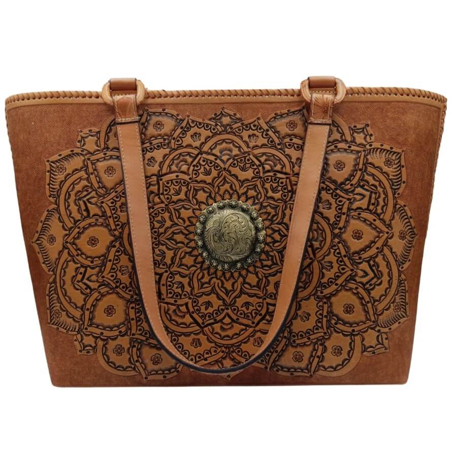 Front view of Sol de Oro full grain leather tote with hand‑tooled mandala and brass concho.